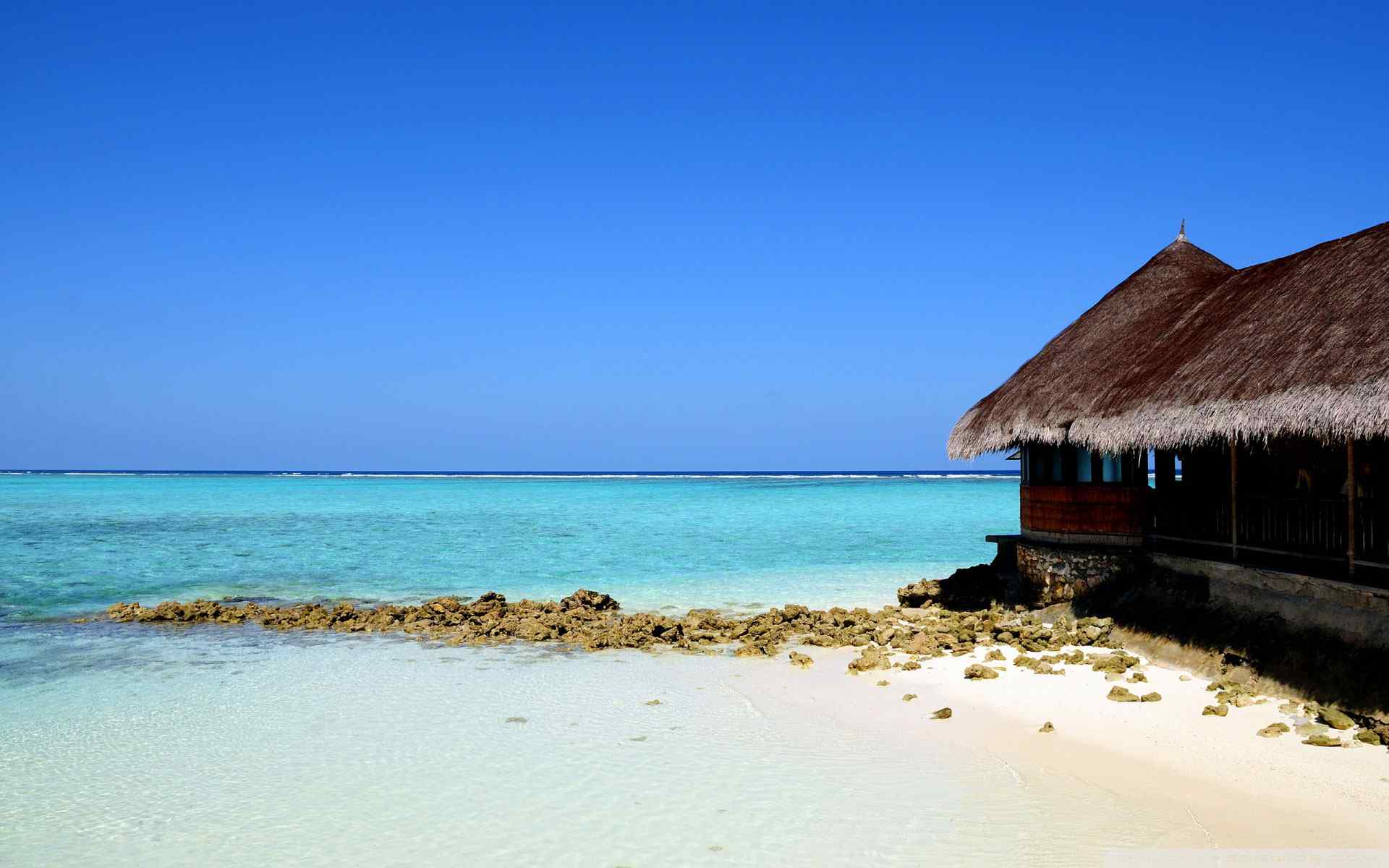 海滩茅屋风景壁纸